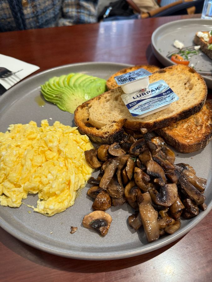 Smashed avocado, eggs on toast, salmon panini